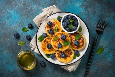 Cottage cheese pancakes top view.の写真素材