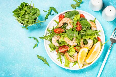 Shrimp salad with vegetables and leaves.の写真素材