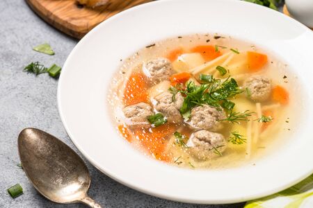 Meatballs soup with vegetables top view.の写真素材