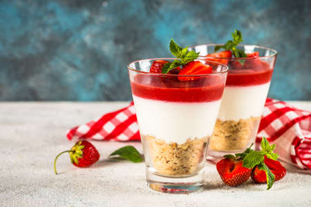 Cheesecake in the glass. Delicious Cheese cake with strawberry, no baked dessert.