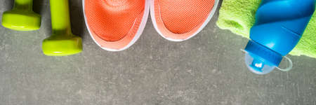 Fitness equipment at stone background top view.の写真素材