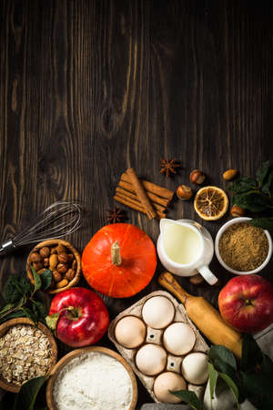 Fall baking ingredients on kitchen table.の写真素材