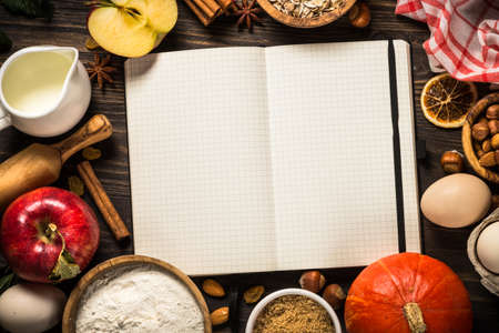 Fall baking ingredients on kitchen table.の写真素材