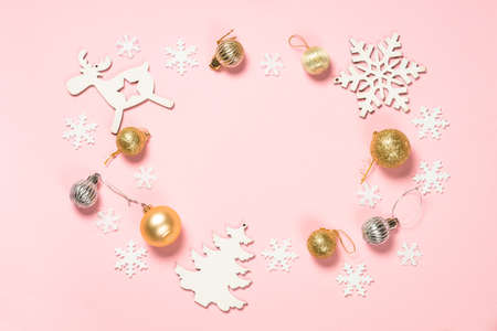 Christmas pink flat lay background with holiday decorations.の写真素材