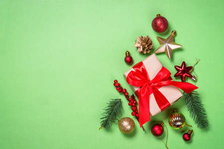 Christmas flat lay background with fir tree and decorations.