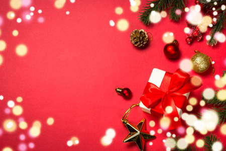 Christmas flat lay background with fir tree and decorations.