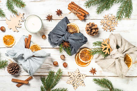 Eco friendly and zero waste Xmas presents wrapped in clothes with natural materials.の写真素材