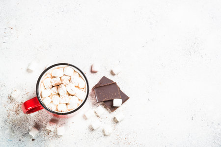 Hot chocolate with marshmallow at white table.の写真素材
