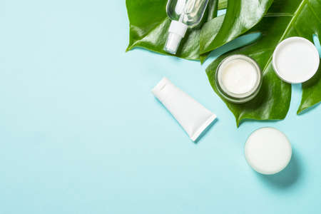 Natural cosmetic products at color background.