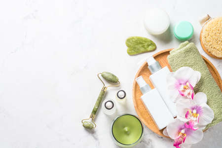 Spa therapy, wellness, skincare product at white.