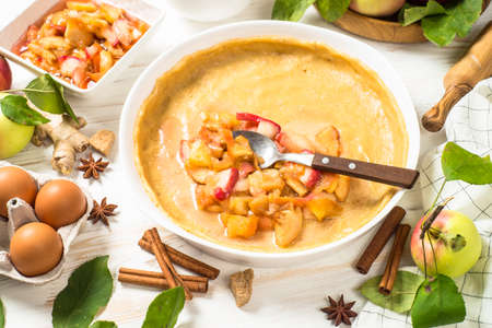 Apple pie with ingredients for cooking top view.の写真素材