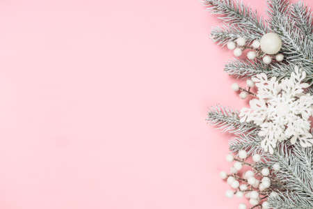 Christmas decorations at pink background top view.の写真素材