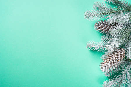 Christmas decorations at mint background top view.の写真素材