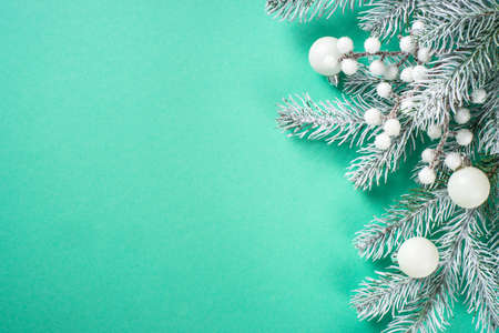 Christmas decorations at mint background top view.の写真素材