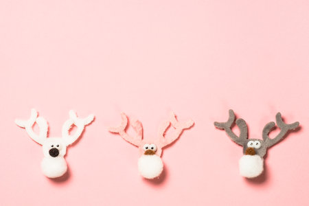 Fluffy holiday decoration at pink background.の写真素材