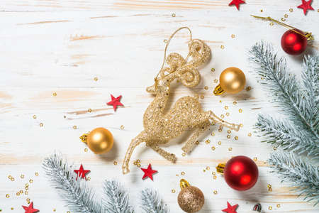 Christmas background with fir tree and golden holiday decorations.の写真素材