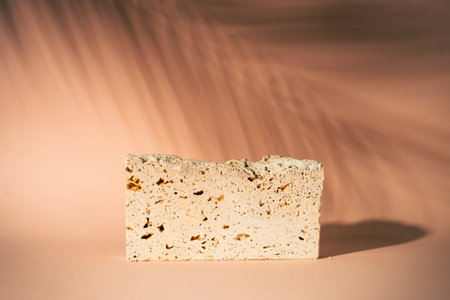 Stone podium for presentation cosmetic products.