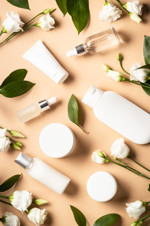 Natural cosmetic products with green leaves and flowers.の写真素材