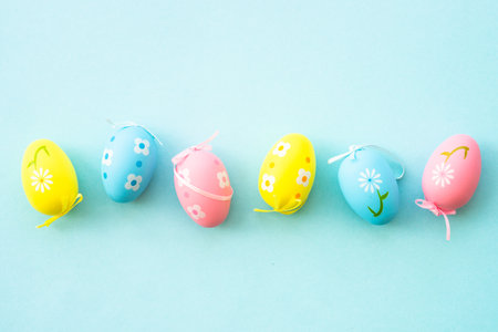 Easter eggs on blue background.の写真素材