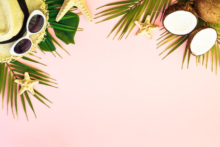 Summer flat lay background tropacal leaves on pink.の写真素材