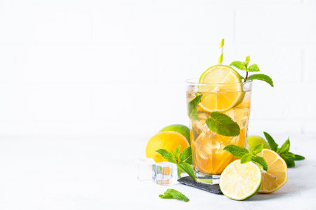 Iced tea with lemon, lime, mint and ice.の写真素材