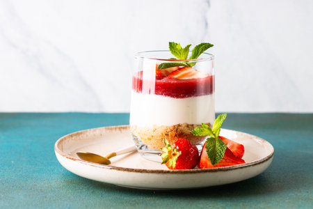Strawberry cheesecake in glass, no baking dessert.の写真素材