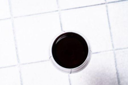 Red wine in glass top view.の写真素材