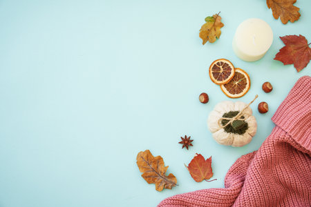 Autumn background on blue. Flat lay.