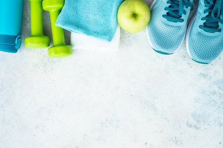 Fitness equipment on pink background, flat lay image.の写真素材