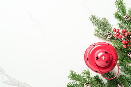 Christmas lantern and spruce tree on white background. Christmas greeting card.の写真素材