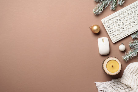 Christmas decor, candle and white knitting scarf with present box.の写真素材