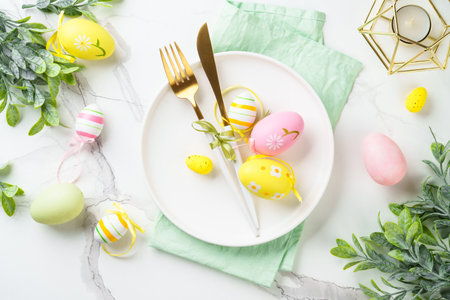 Easter table setting on white background.の写真素材