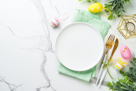 Easter table setting on white background.の写真素材