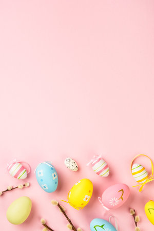 Easter eggs and decorations on pink background. Flat lay image with copy space.の写真素材