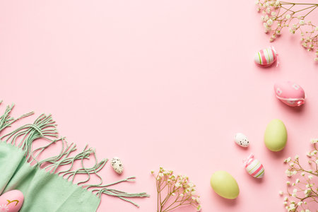 Spring flat lay background. Easter composition with eggs, scarf and flower.の写真素材