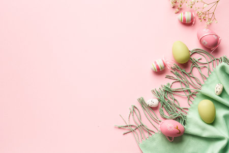 Easter composition with eggs, scarf and flower. Flat lay with copy space.の写真素材