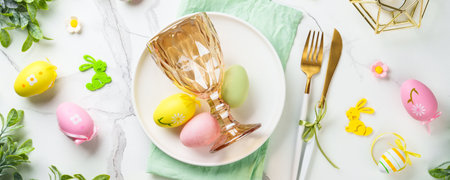 Easter table setting on white background. White plate, cutlery and easter decorations. Web banner...