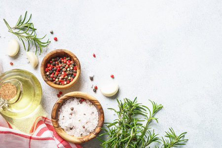 Food background with spices, herbs and utensil on white background.の写真素材