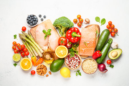 Healthy heart Food background. Fresh vegetables, meat, fish, grains, leaves and fruits. Top view.の写真素材