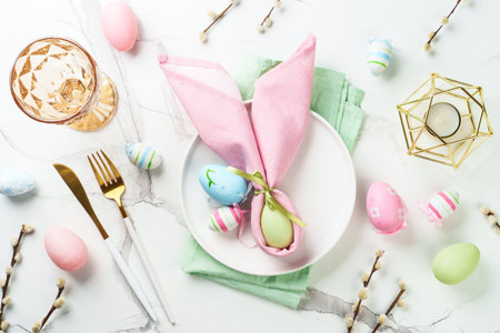 Easter table setting on white background.