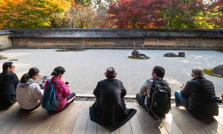 Kyoto/Japan - November 26: People are seeing the rock garden at Ryoanji temple.のeditorial素材