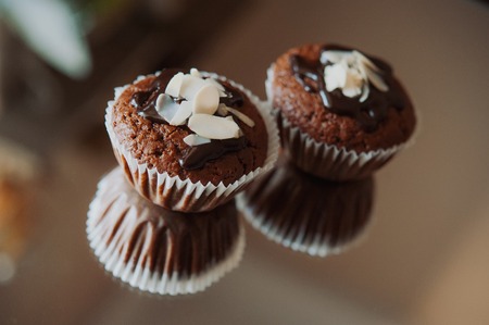 two chocolate cupcakes with almondsの写真素材