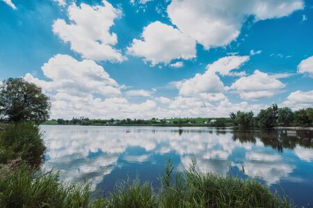 landscape with beautiful lake and blue skyの写真素材