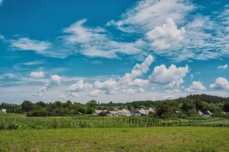 Landscape with a beautiful sky and cloudsの写真素材
