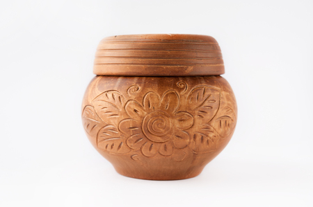 Beautiful old clay pot with floral patternsの写真素材