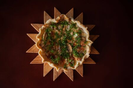 beautiful round cake with chicken and mushroomsの写真素材