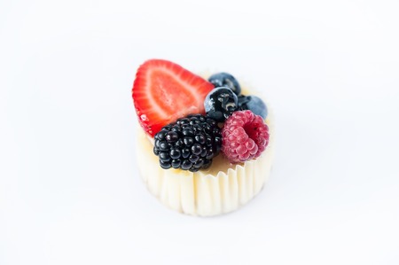 Beautiful sweet little cakes cheesecake with fruitの写真素材