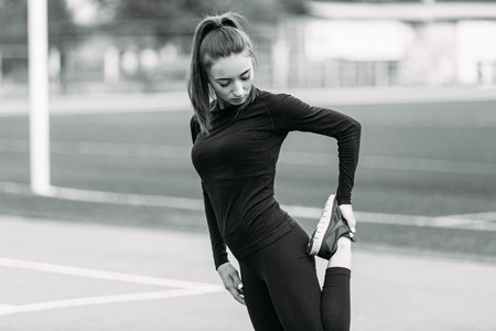 Girl fitness in the stadium