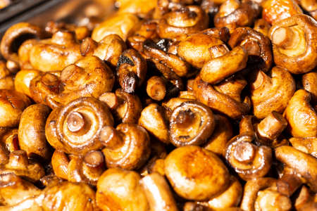 Delicious grilled champignons. Tasty, healthy and aromatic. Top viewの写真素材