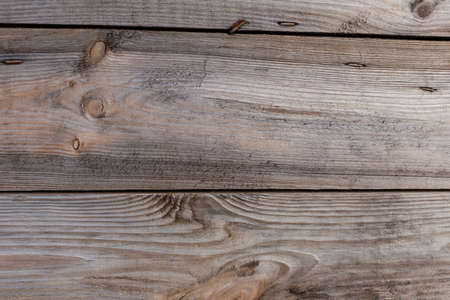 An original background of unpainted raw boards with old nails will decorate your designの写真素材